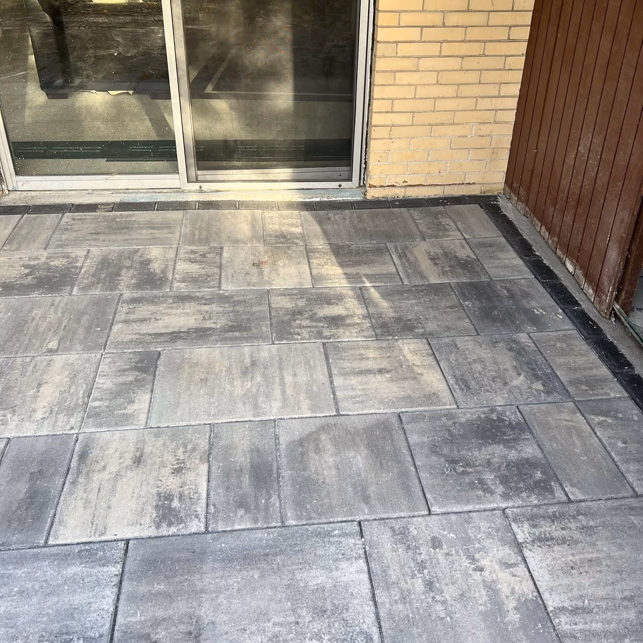 Custom paver patio installation by Roi Property Services in Metro Detroit