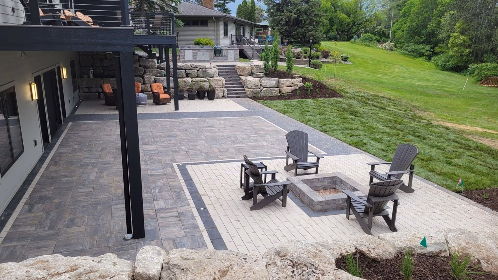 Roi Property Services team delivering professional drainage and hardscaping solutions in Metro Detroit