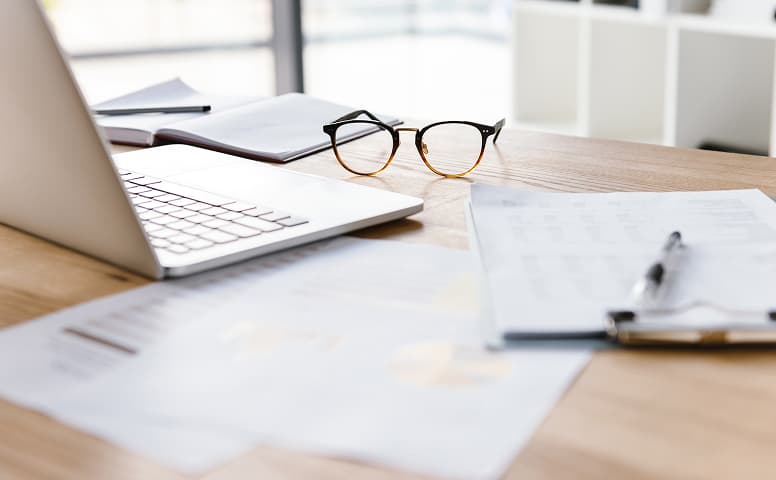office desk with paperwork