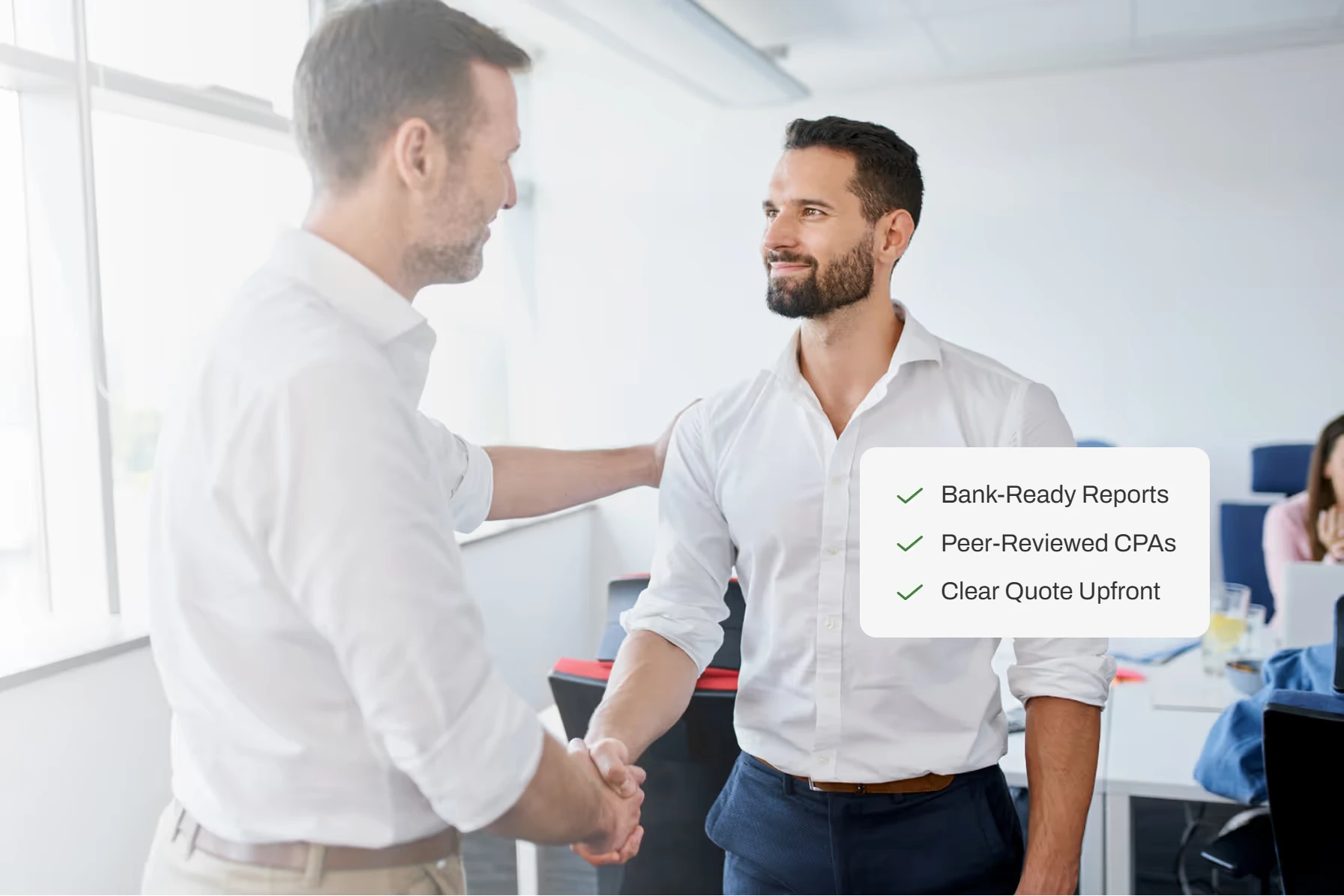 Business owner shaking hands with a CPA after audited financial statements are delivered