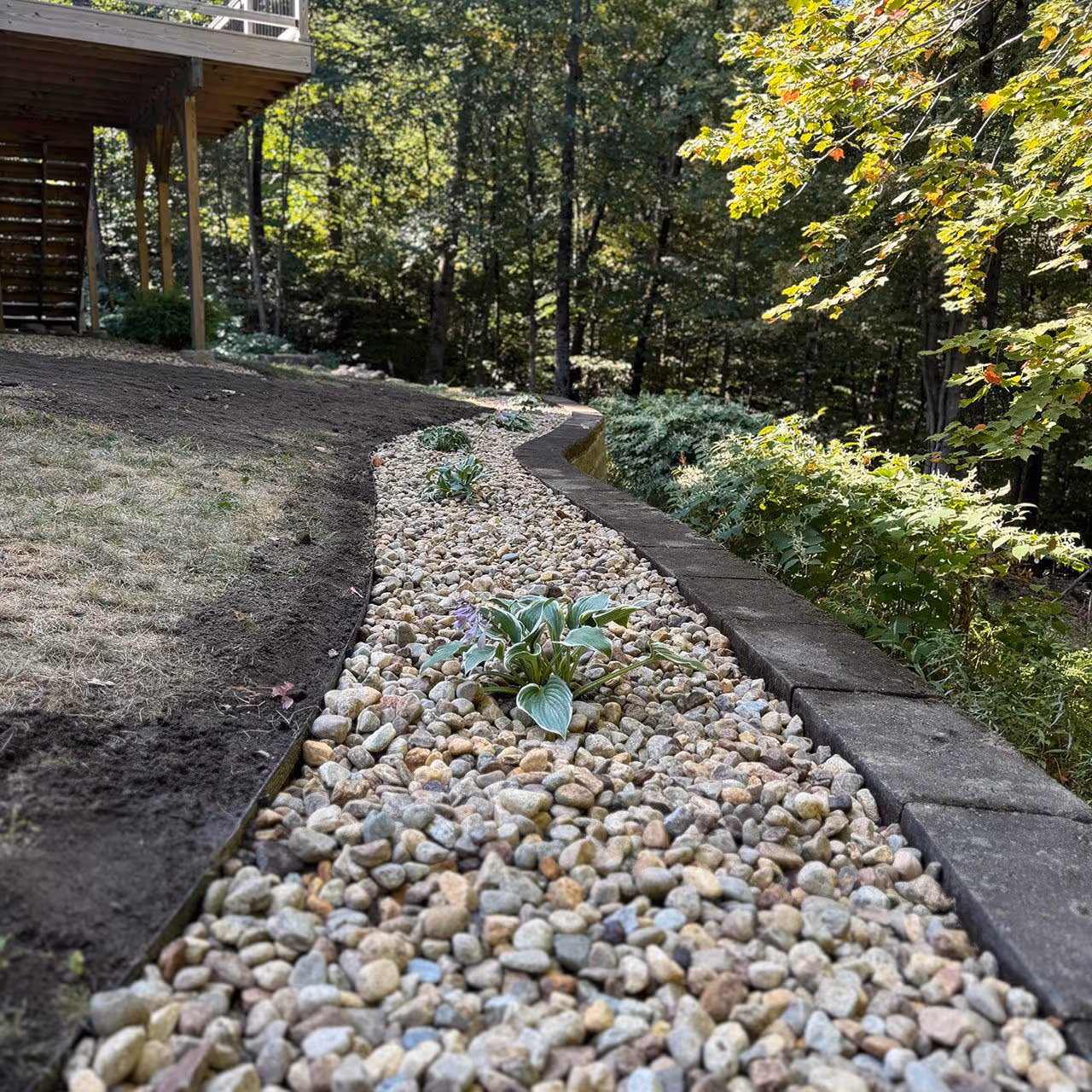 Landscape edging and bed definition for a home in Goffstown, New Hampshire
