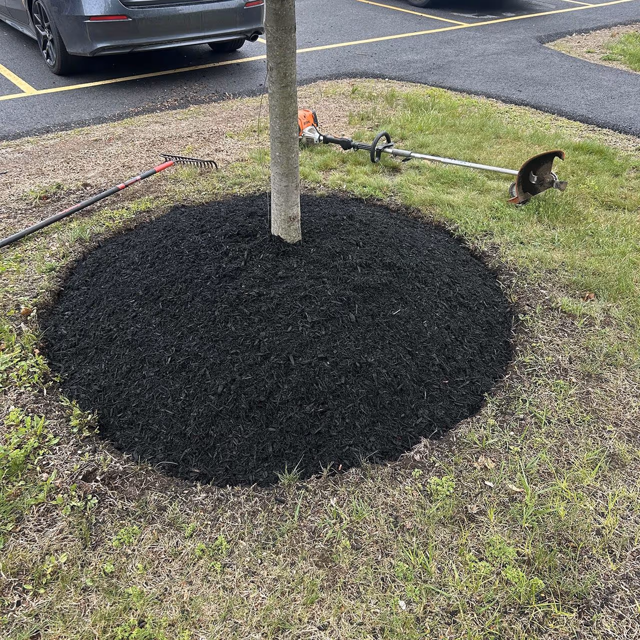 Mulch bed installation for a residential property in Concord, NH