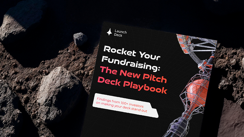 Book titled 'Rocket Your Fundraising: The New Pitch Deck Playbook' on rocky surface with spaceship graphic.