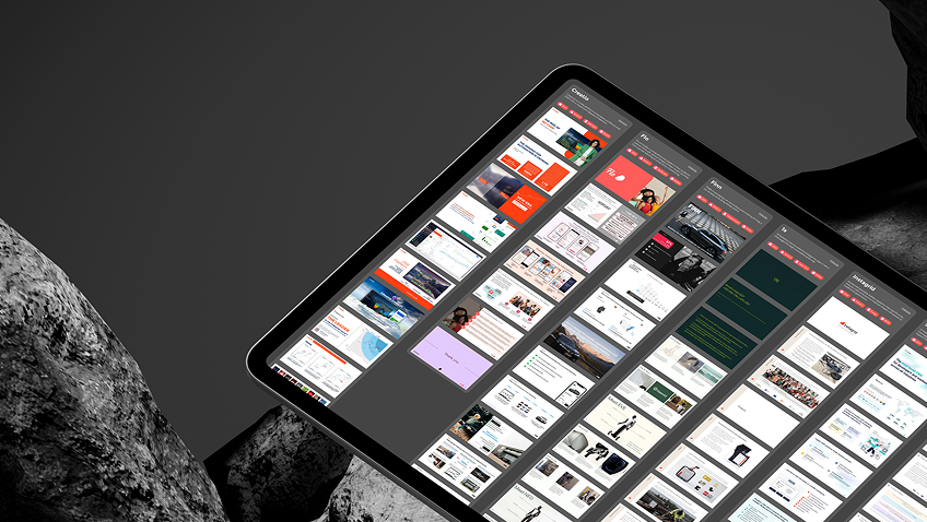 Tablet displaying multiple columns of pitch decks against a dark stone background.