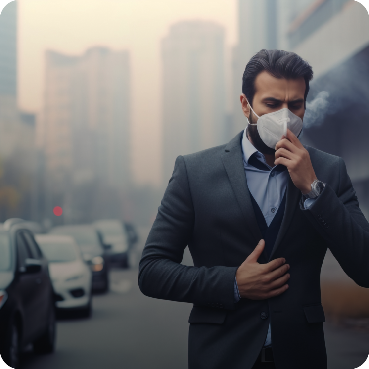Man in a suit wearing a mask and coughing on a city street with heavy air pollution and blurred buildings in the background.
