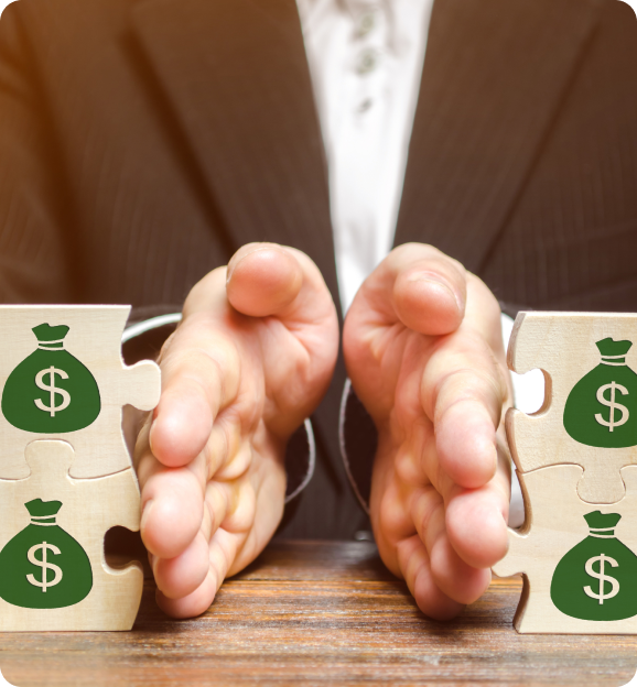 Person in a suit separating two stacks of wooden puzzle pieces with green money bag icons printed on them.