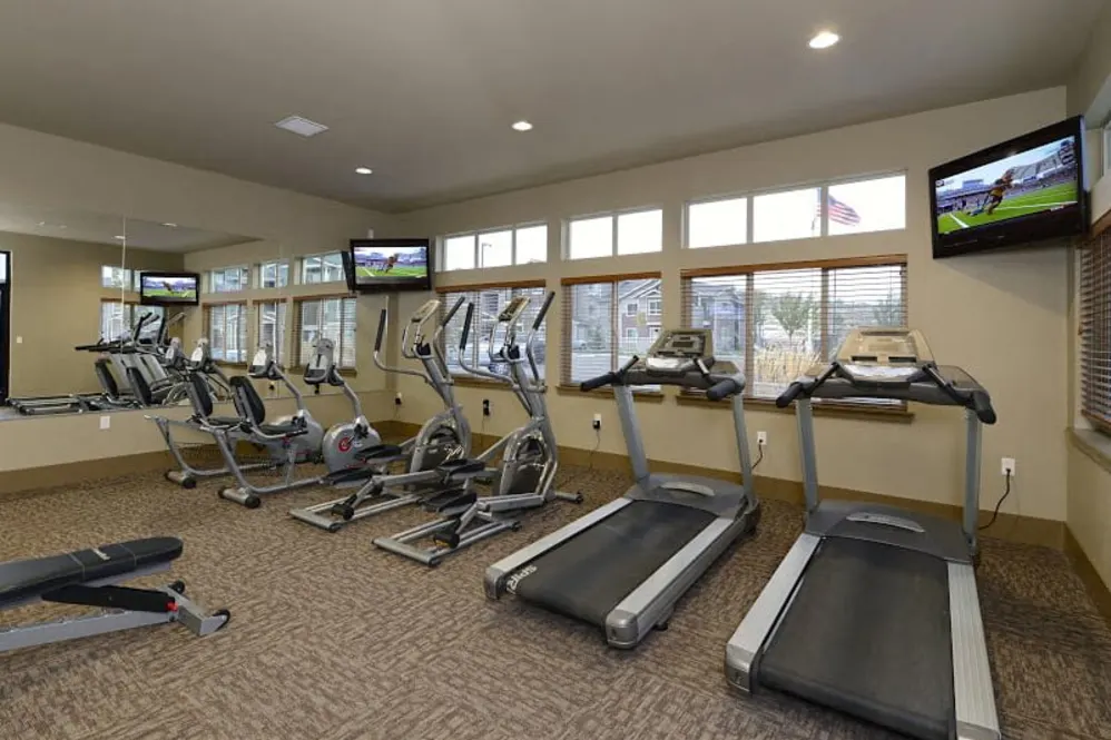 Fitness room with workout equipment and machines