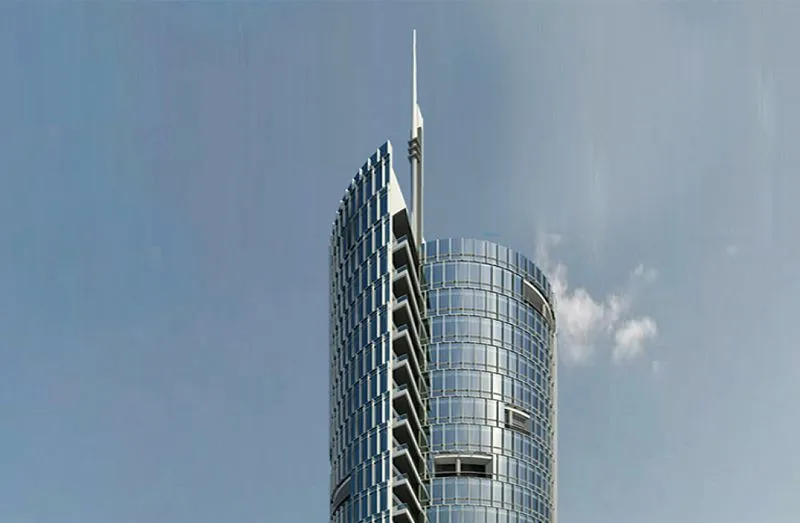 A tall building with a spire on top.