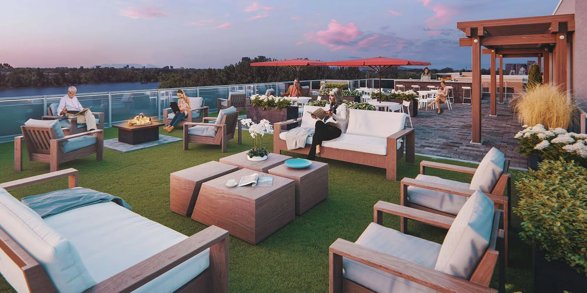 A patio with a table and chairs on a grassy area.