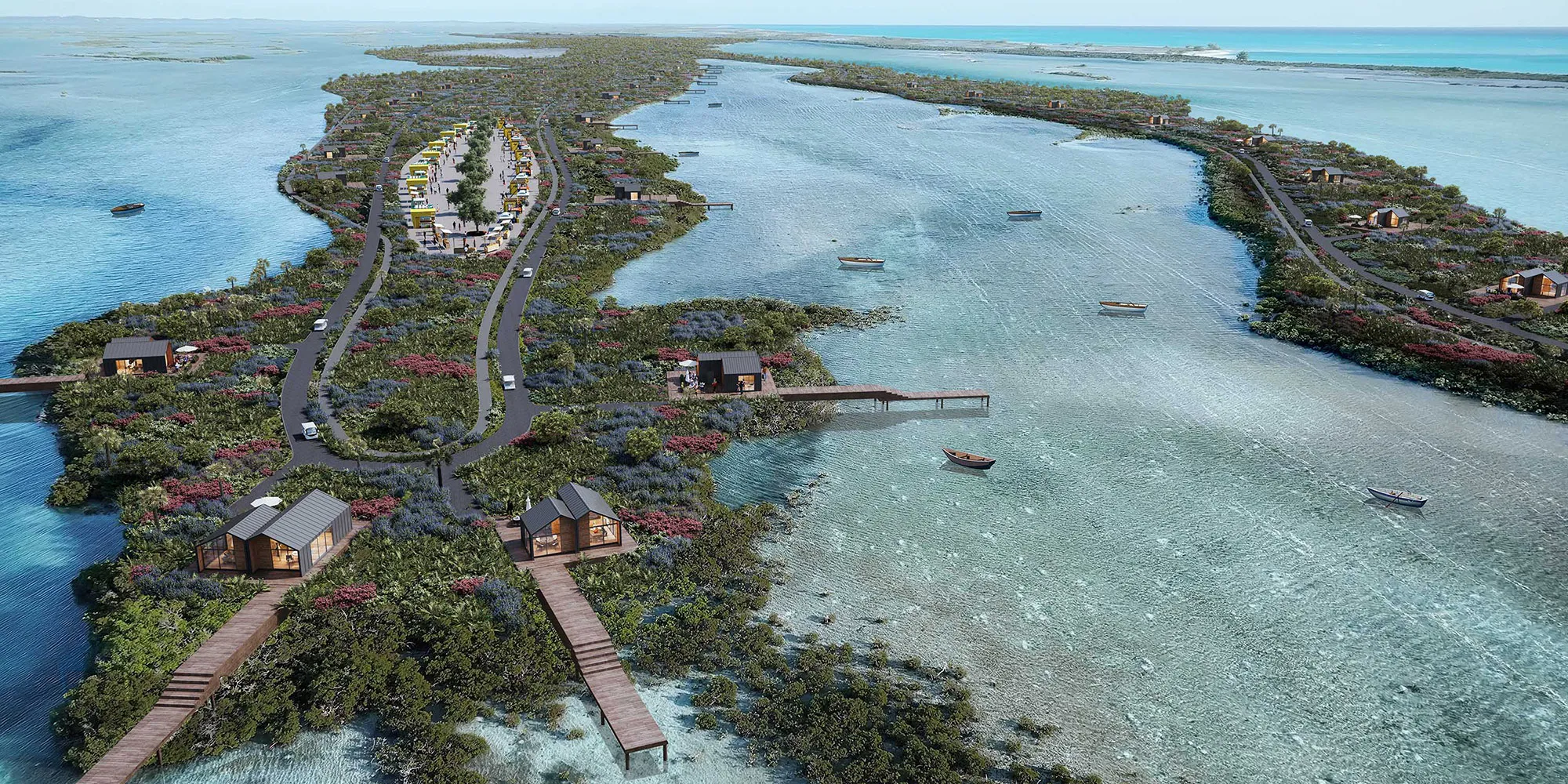 A waterfront development with small modern cabins along the shoreline, private docks extending into the clear blue waters, and boats floating nearby, surrounded by lush vegetation and a winding road.