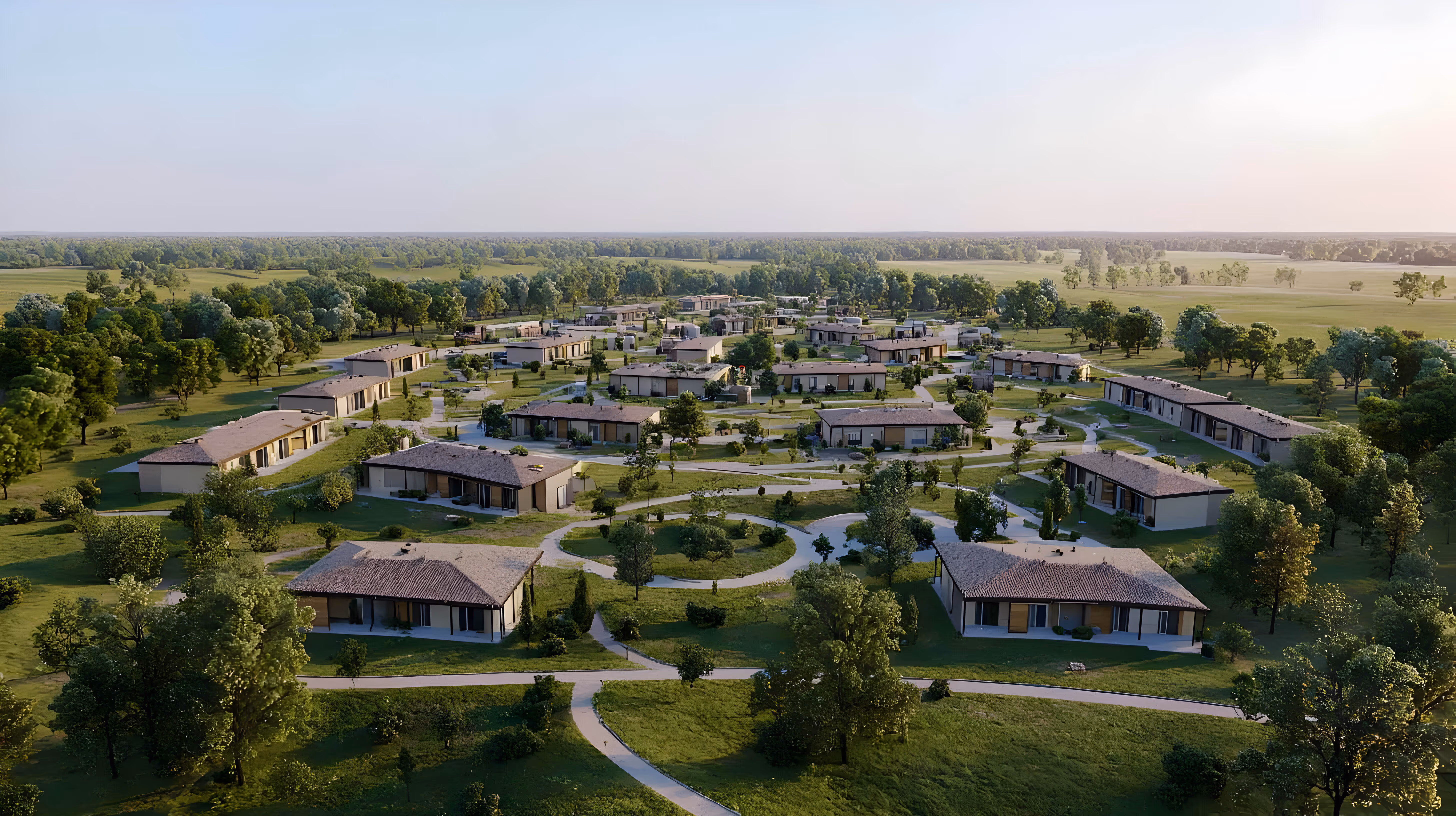 Modern outdoor seating area with two cushioned sofas facing a wooden coffee table under a pergola, overlooking a pool surrounded by tropical plants and lounge chairs.