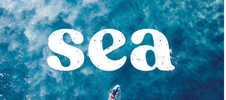 Aerial view of ocean water with white text 'sea' overlayed on the image.
