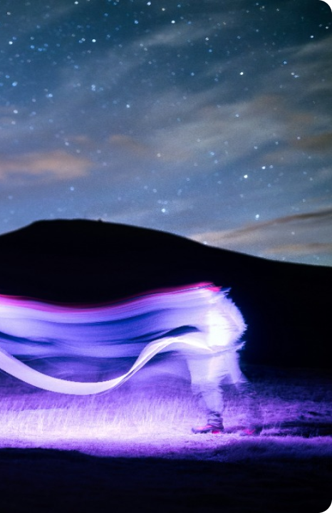 a-long-exposure-photo-of-a-wave-in-the-night-sky