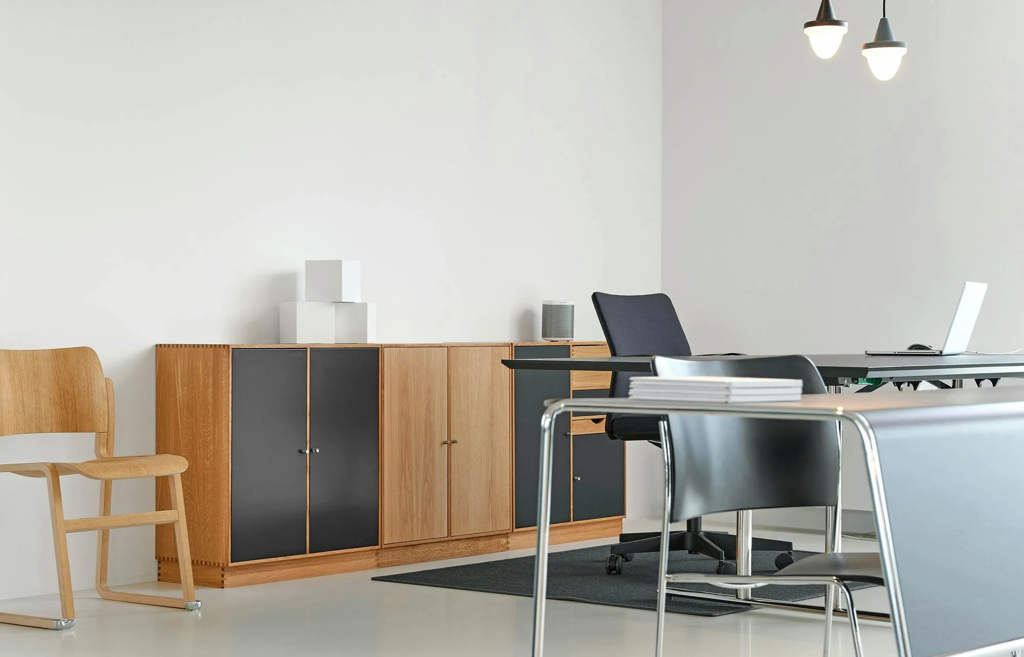 Minimalist office with desk and chairs