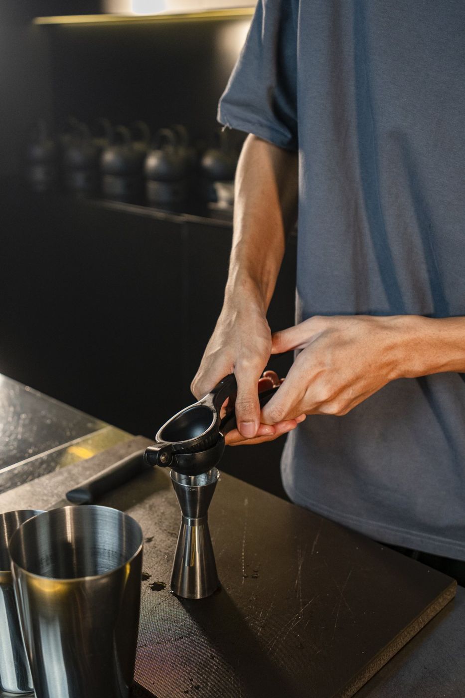 Pressing fresh citrus for a cocktail at the FOOM bar
