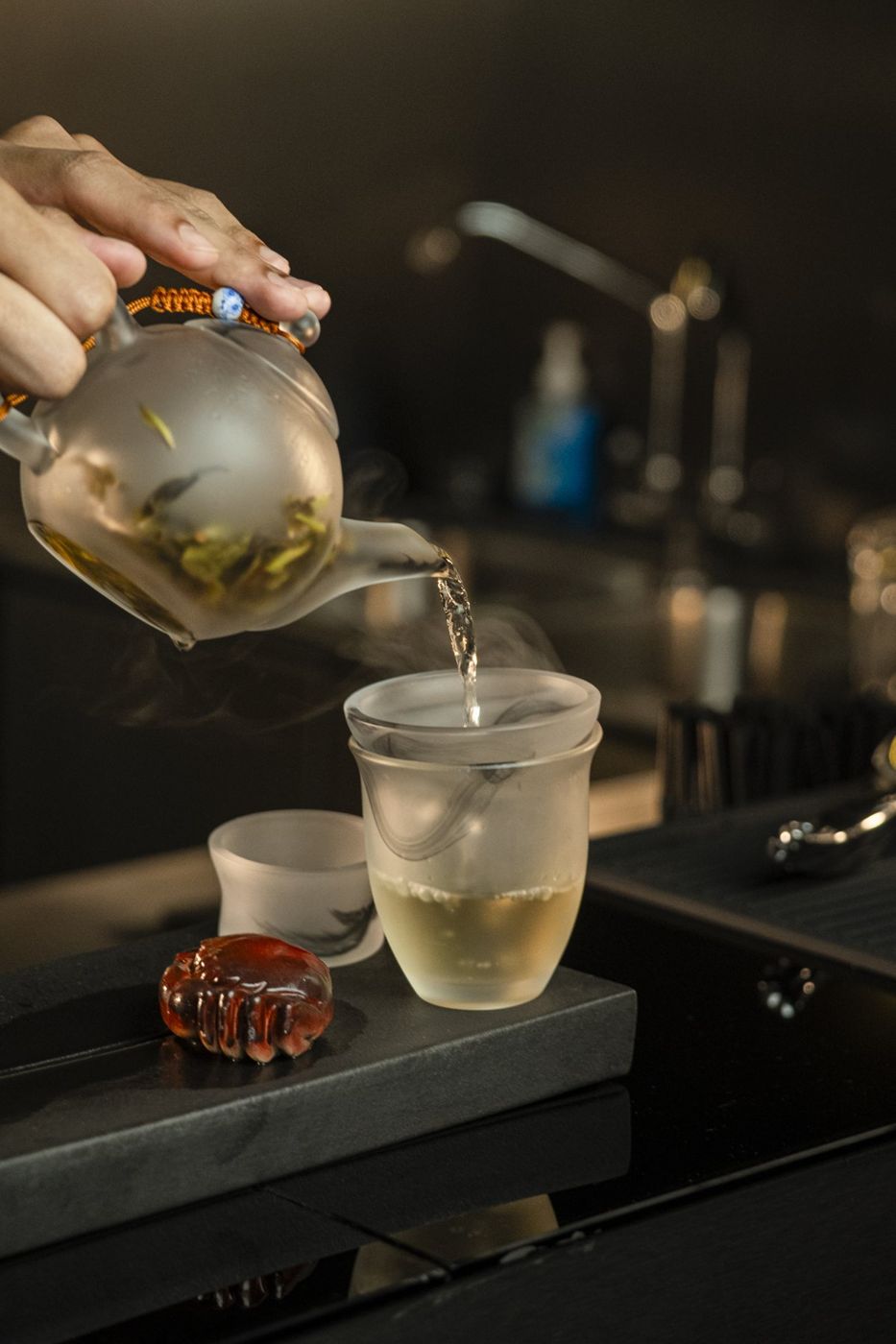 Chinese tea poured into a frosted glass pitcher at FOOM