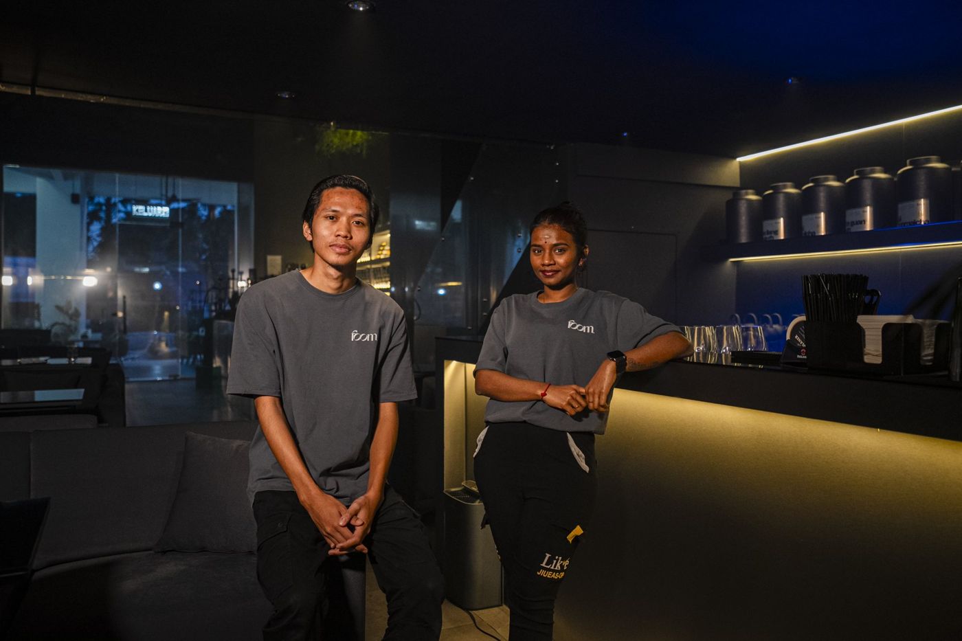 The FOOM team inside the lounge in Johor Bahru, lit for the evening