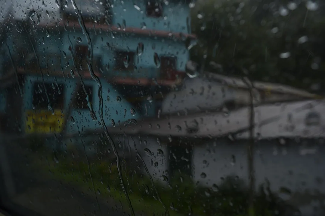 home in Chimacum with rain in the background, illustrating the local climate - certified heat pump technician in chimacum, wa