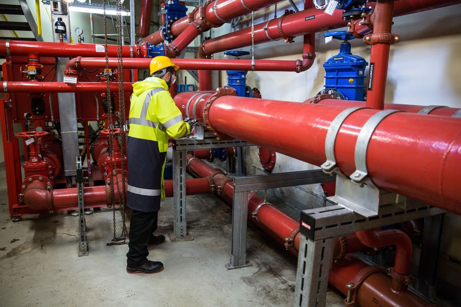 plumber inspecting a main sewer line with professional equipment - drain cleaning when and why it matters plumber inspecting a main sewer line with professional equipment - drain cleaning when and why it matters