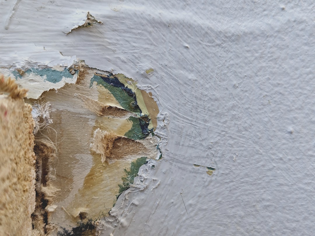 bubbling paint stained drywall hidden wall leak