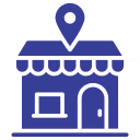 Icône de magasin local avec un repère de localisation au-dessus.