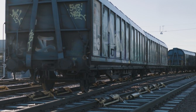 Freight wagons above DECEL pneumatic retarders at Sävenäs marshalling yard