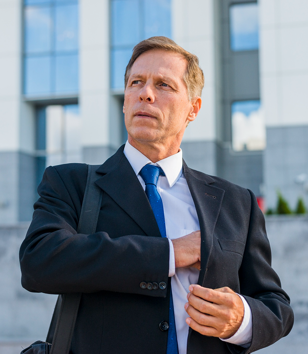 A man in a black suit