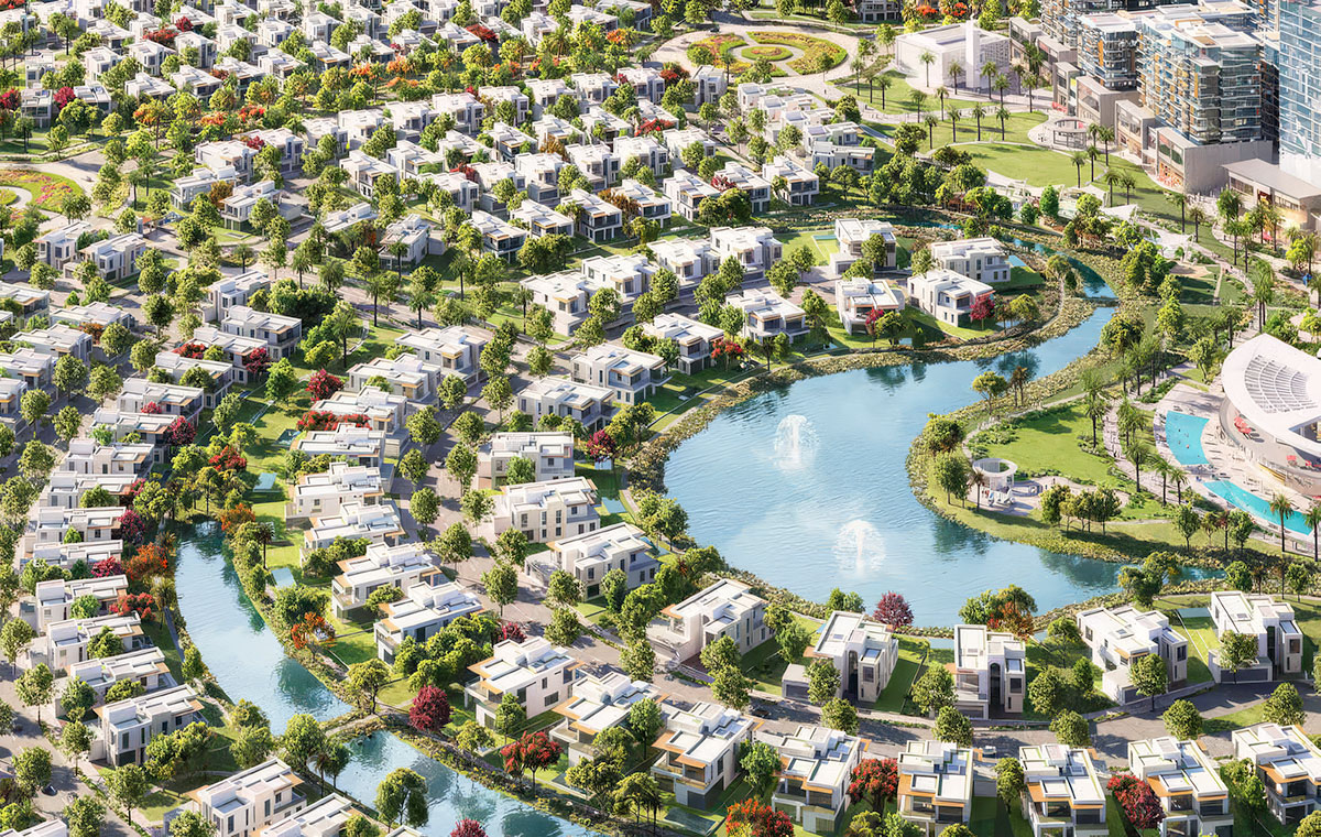 Hayat by Dubai South townhouse community with landscaped green areas and lagoon in Dubai South.