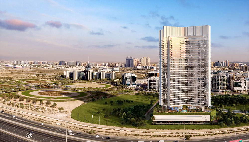 Horizontal exterior render of Tria by Deyaar residential tower in Dubai Silicon Oasis with surrounding roads and green areas.