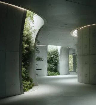 Modern architectural walkway with curved concrete columns and integrated greenery under soft natural light.