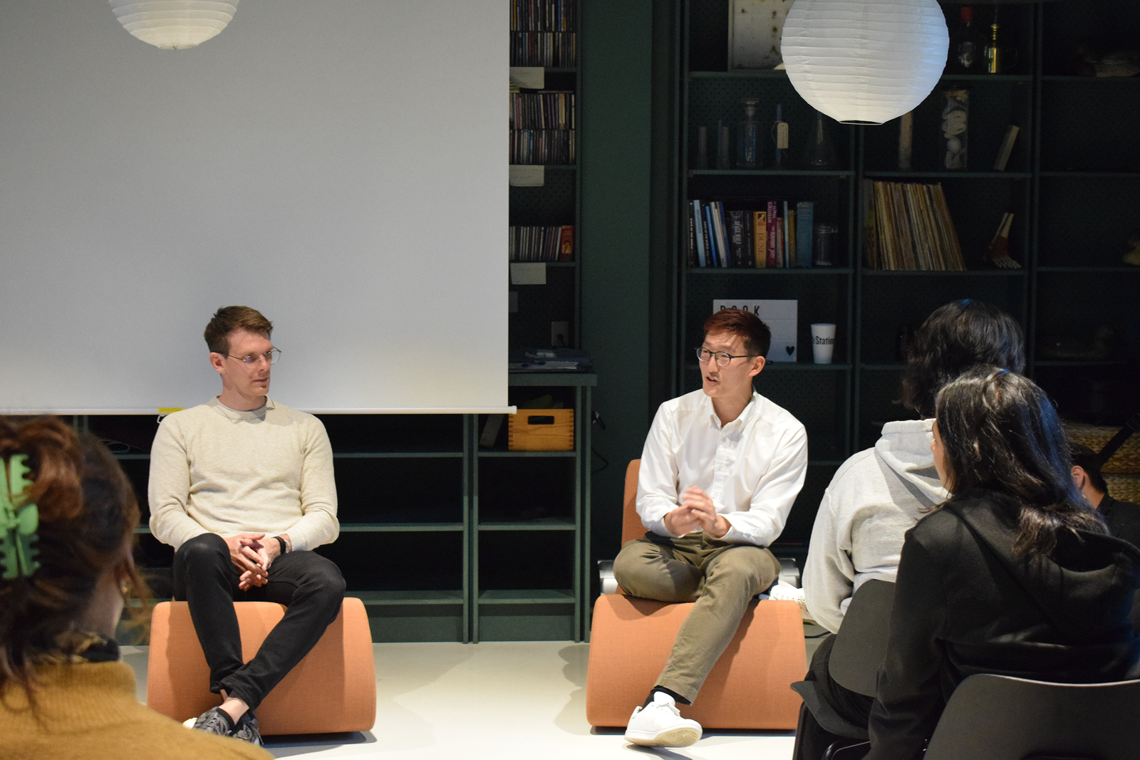 Student Consultants engaging in a hot seat Q&A with partners at the Kick Off event.