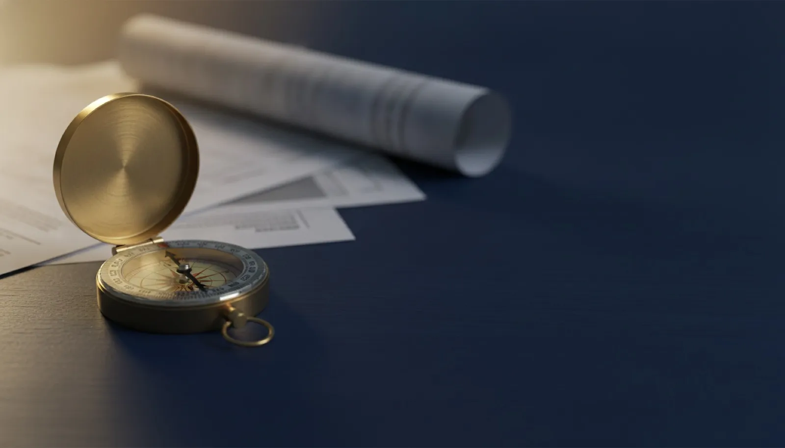 Compass resting on policy documents