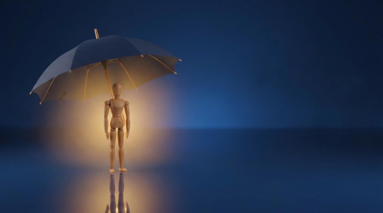 A figure sheltered under a navy umbrella with a warm glow, representing the protection disability insurance provides