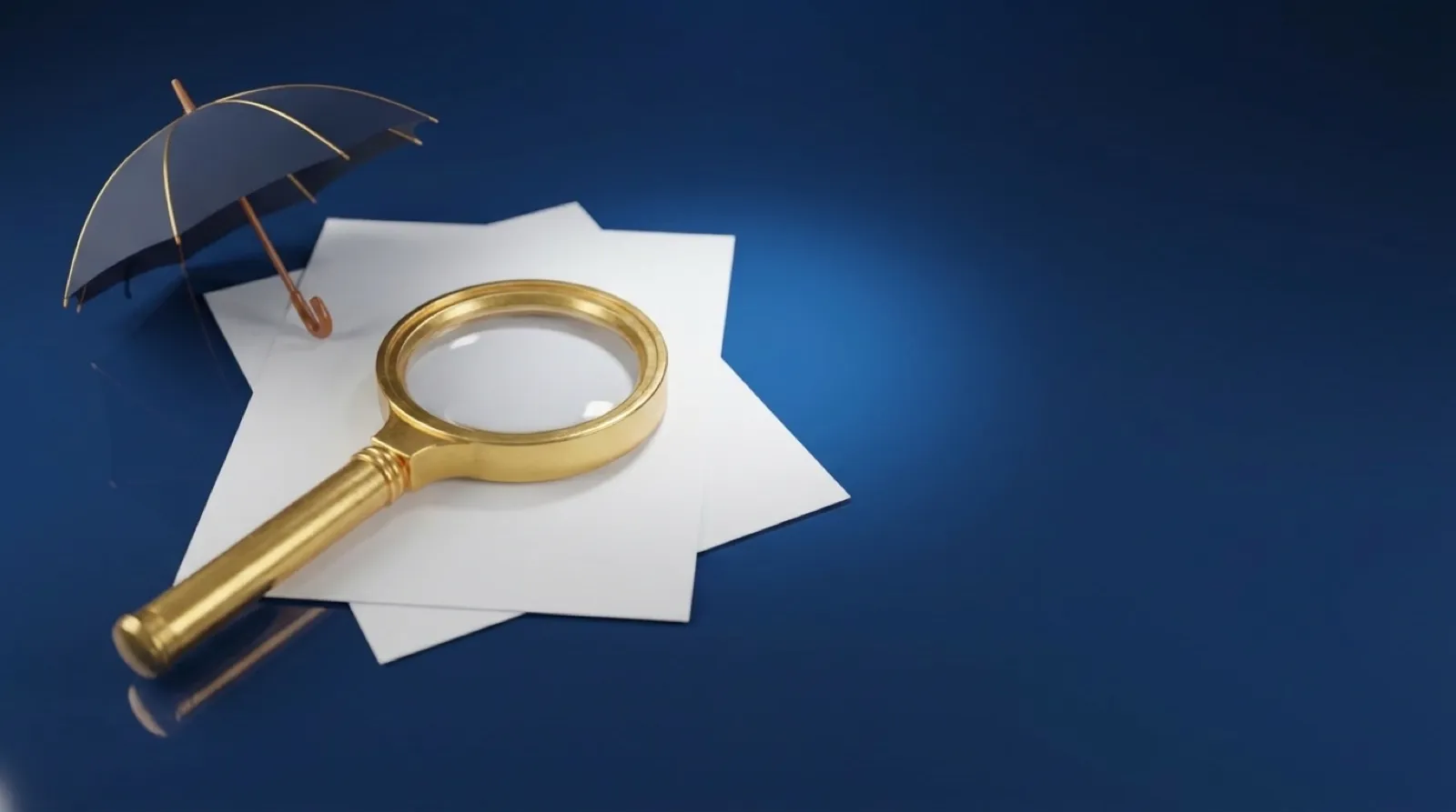 A gold magnifying glass over blank policy documents beside a navy umbrella, representing comparing disability insurance policies