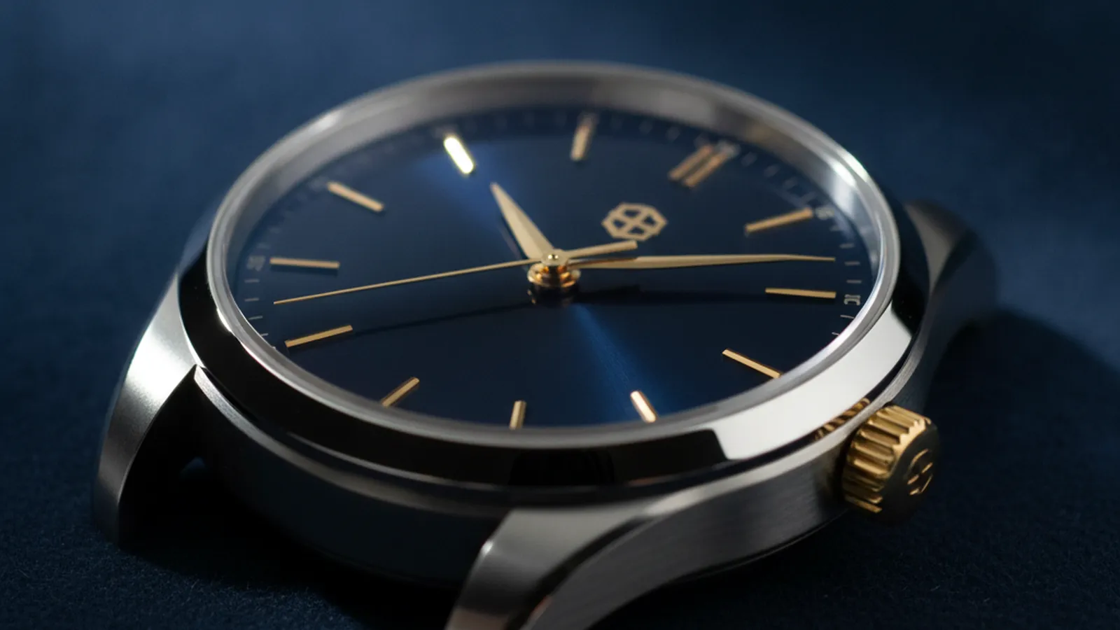 Luxury wristwatch on a dark surface