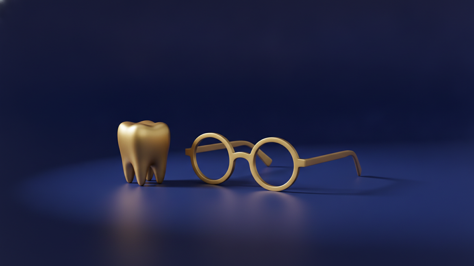 A small gold tooth and a pair of gold spectacles side by side on a dark navy background, representing the two benefits most often left out.