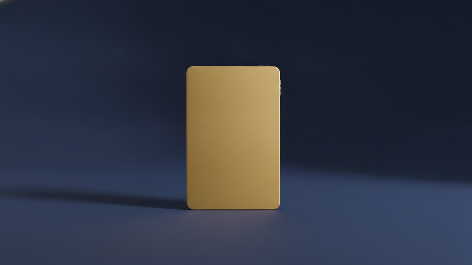 A slim gold tablet standing upright alone on a dark navy background with a blank screen, representing a virtual doctor visit.
