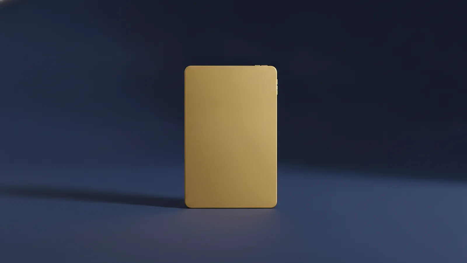 A slim gold tablet standing upright alone on a dark navy background with a blank screen, representing a virtual doctor visit.