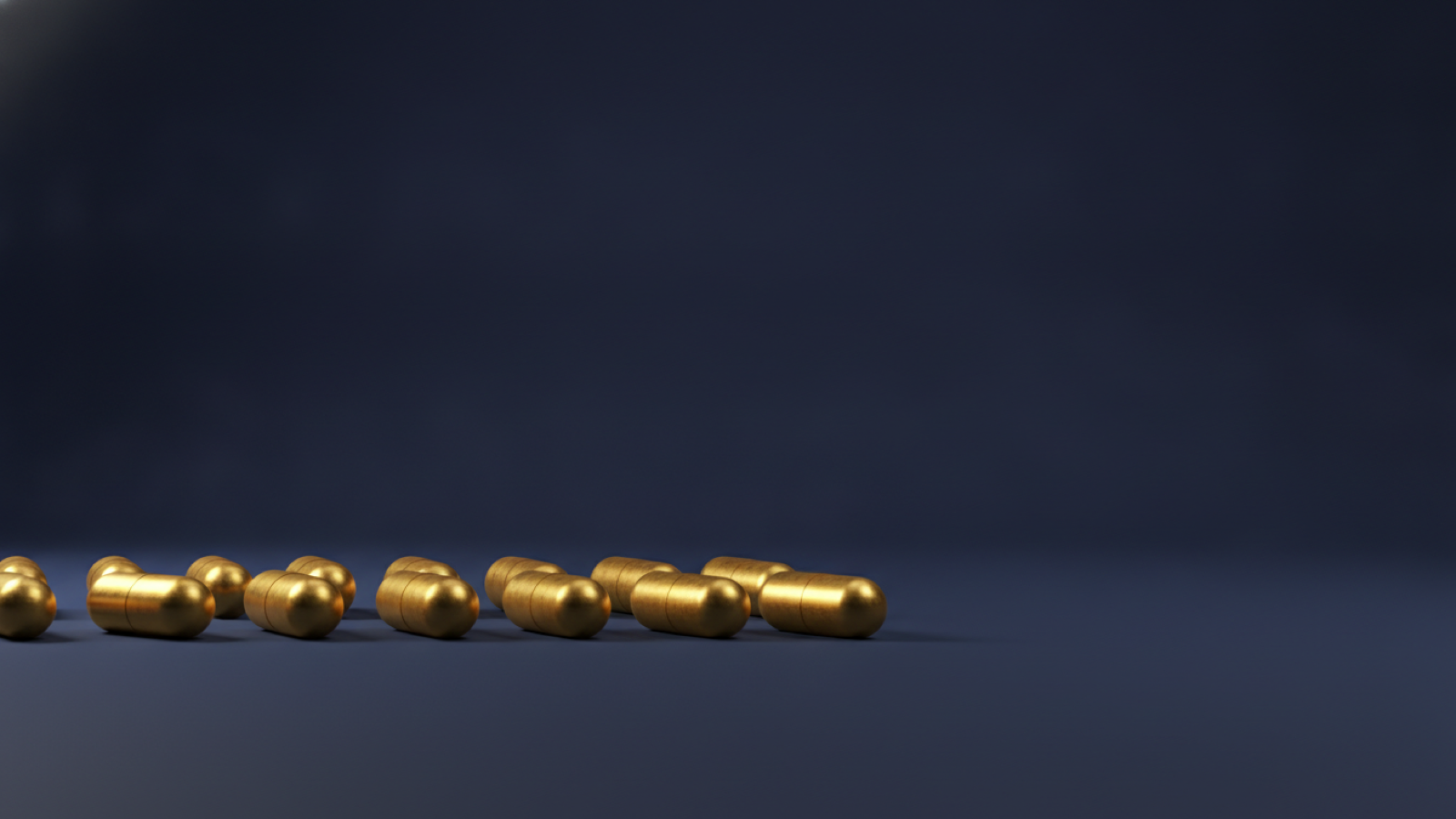 A row of gold medicine capsules stopping partway across a deep navy floor, representing an annual allowance of fills running out.