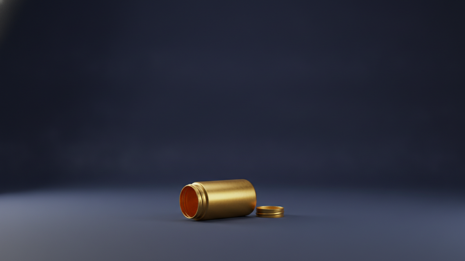 A single gold prescription bottle lying on its side and empty on a deep navy background, representing medication that is not covered.