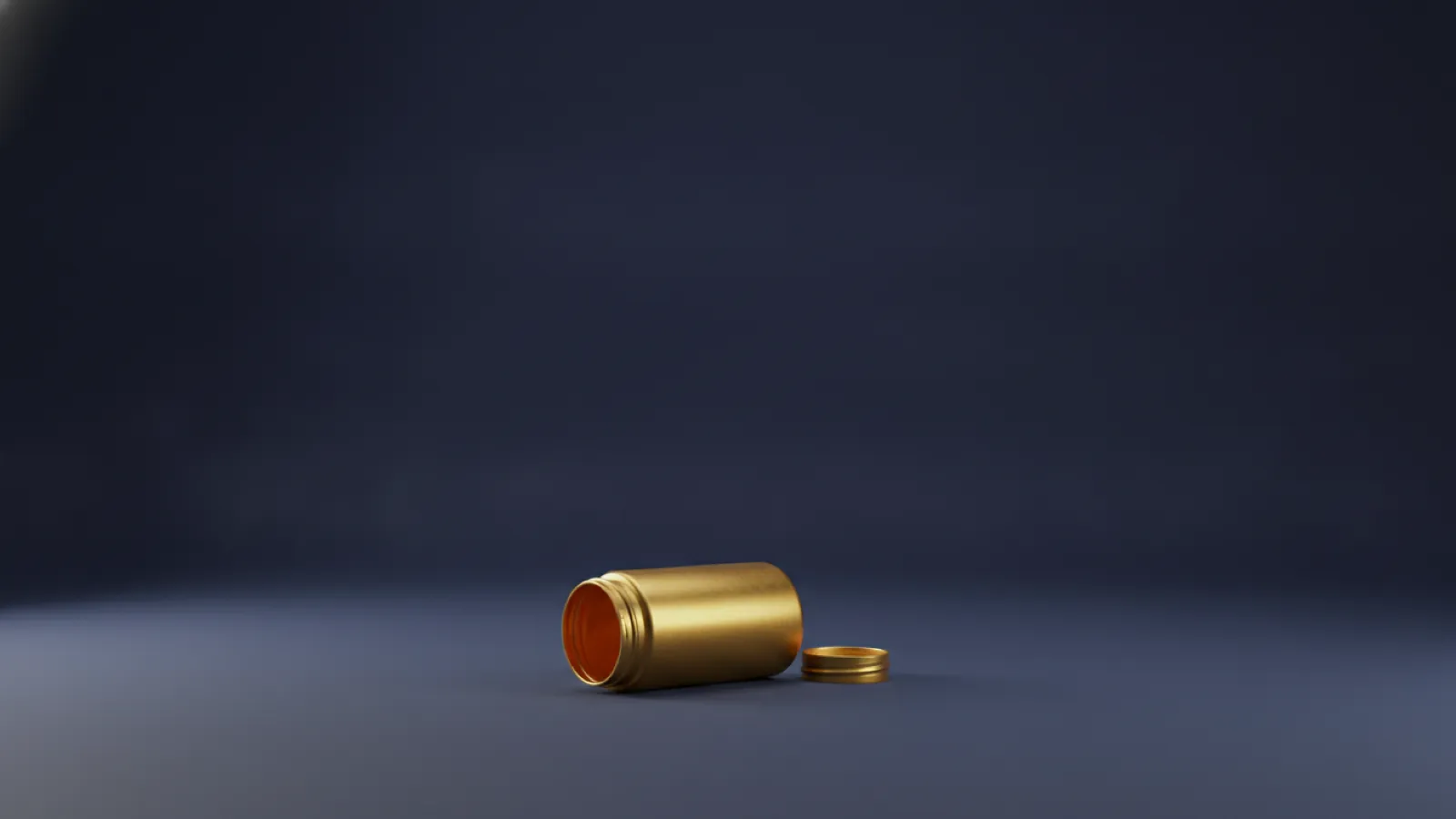 A single gold prescription bottle lying on its side and empty on a deep navy background, representing medication that is not covered.
