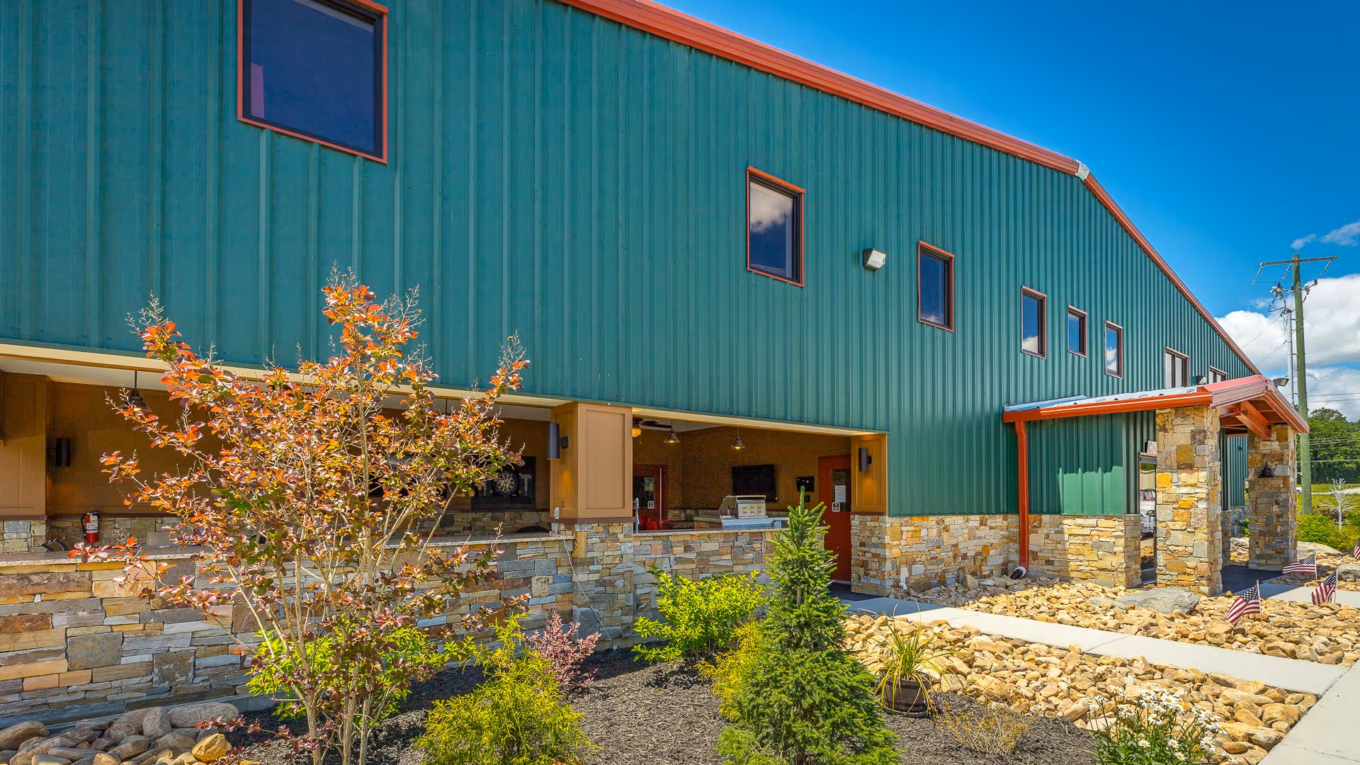 HP check in with view of outside area, landscaped bushes and small trees