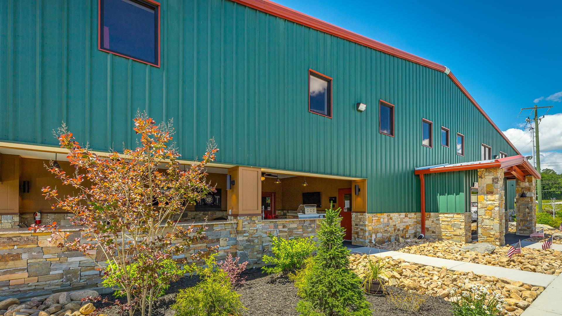 HP check in with view of outside area, landscaped bushes and small trees