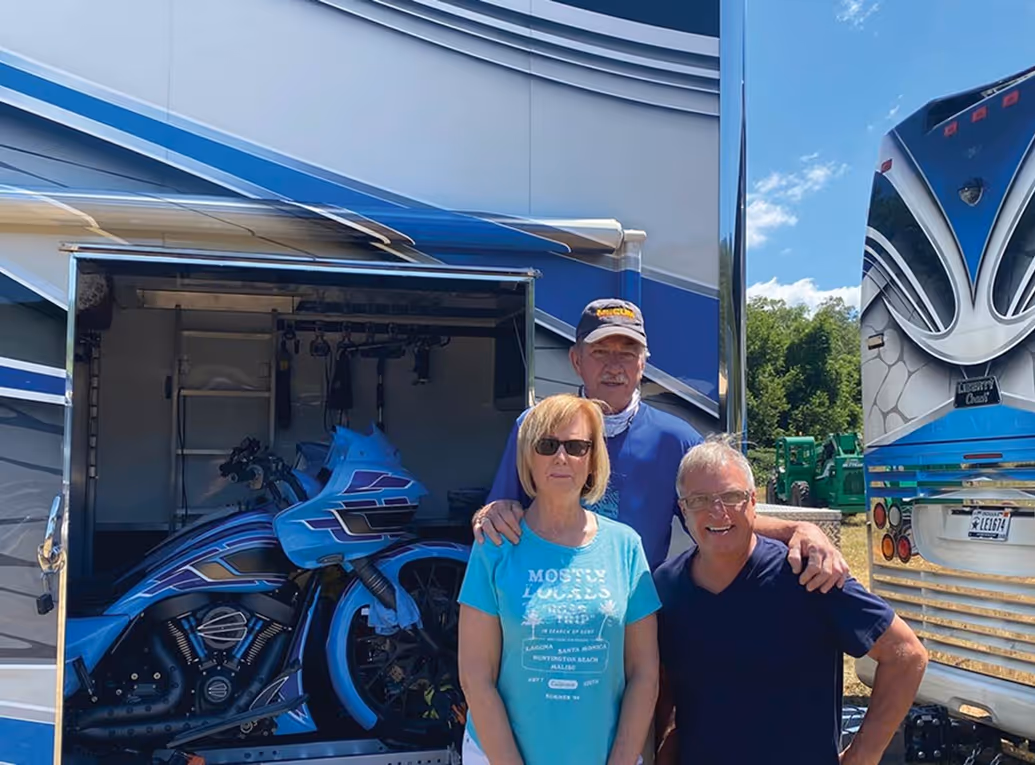 Dean Louch of Elkhart with Karen and John at the the River Landing Rally.