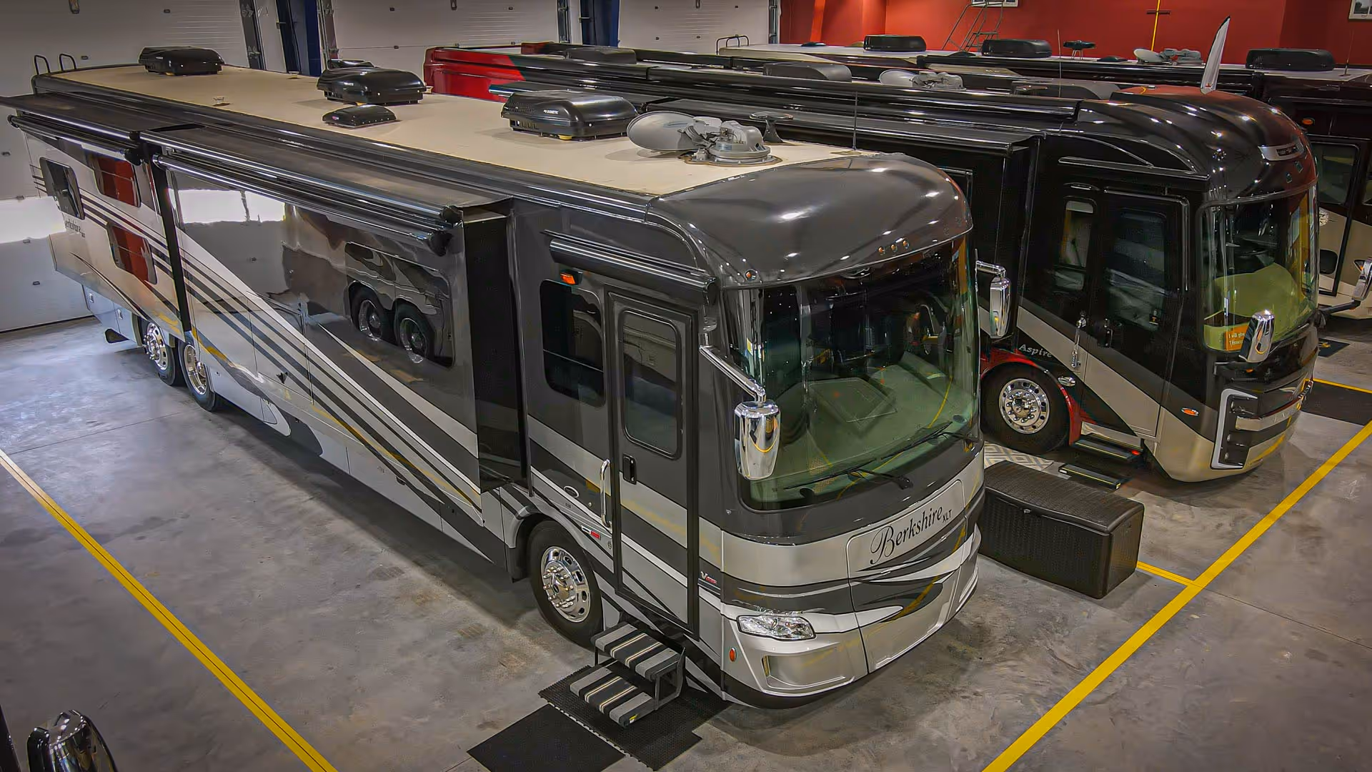 Inside Hawkins Pointe Luxury Storage facility with parked motorcoaches.