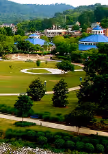 Coolidge Park green lawn and pavilion buildings.