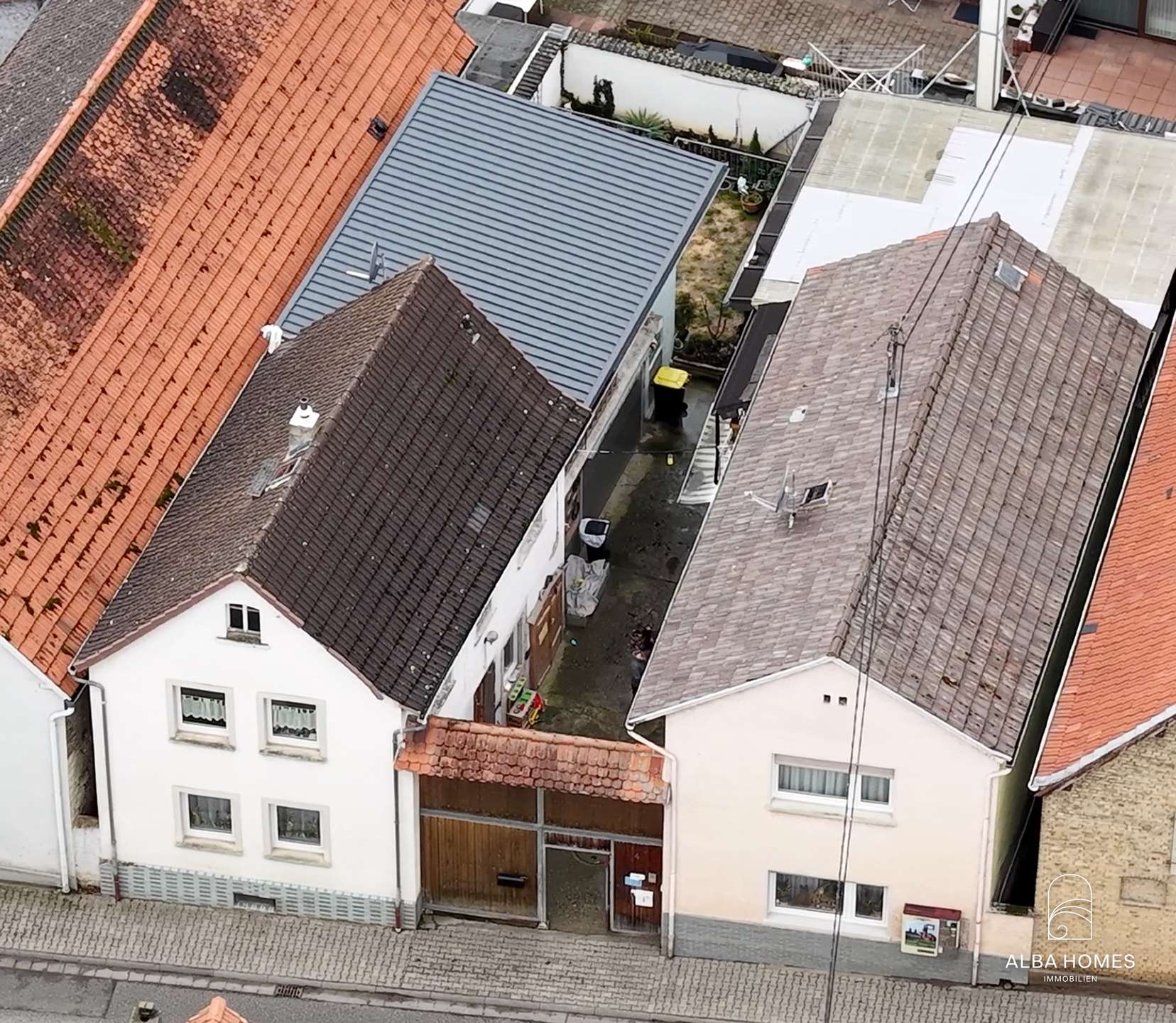 Zwei Häuser. Ein Grundstück. Außergewöhnlich viele Möglichkeiten.