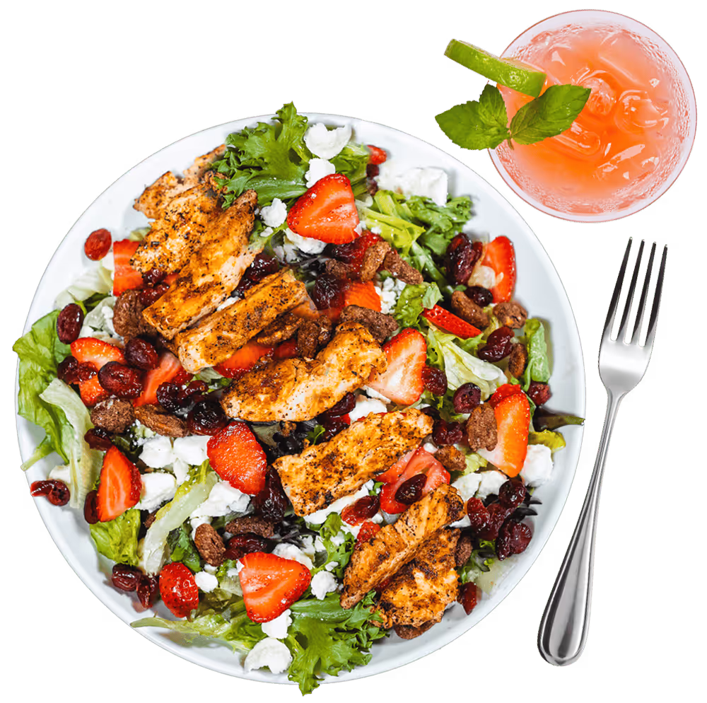 top down view of a grilled chicken salad.