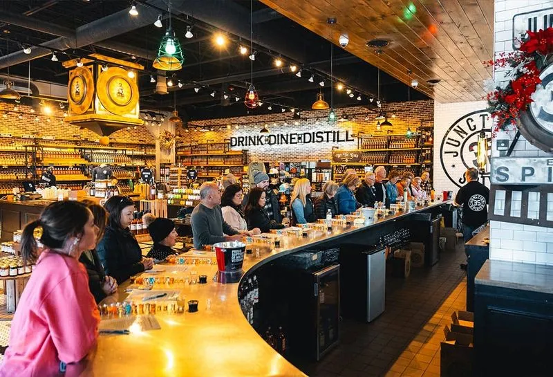 Customers sitting at the bar at Junction 35 Spirits in Pigeon Forge, Tennessee.