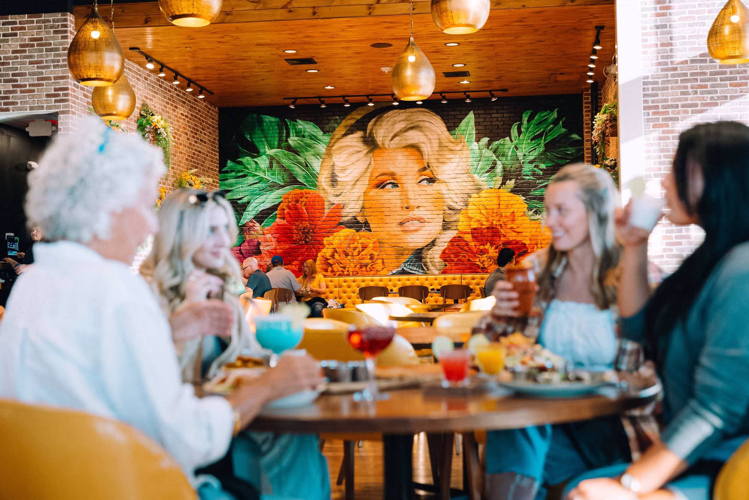 people enjoying food and drink in the interior of the restaurant at Azul Cantina at the Mountain Mile Mall in Pigeon Forge, Tennessee